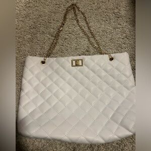 White and gold purse.